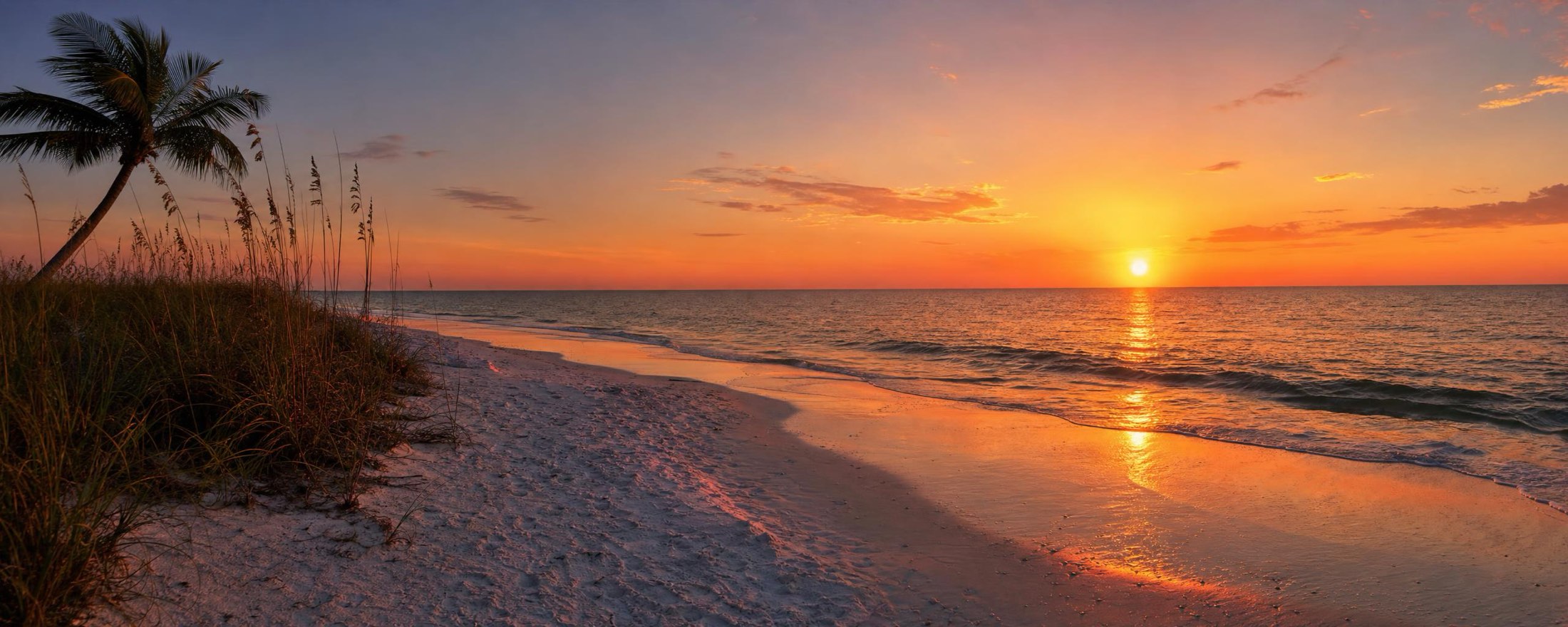 Sunset over the Gulf of Mexico from a white sand beach