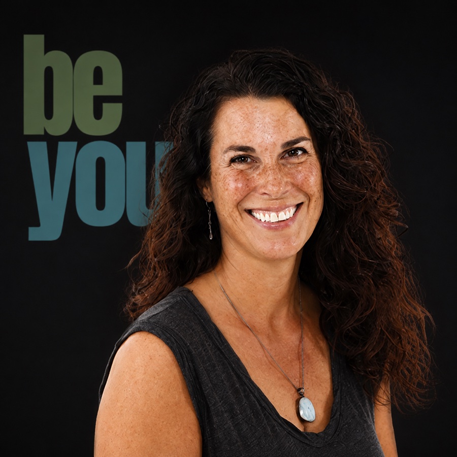 Krista Flynn in front of the BE YOU backdrop